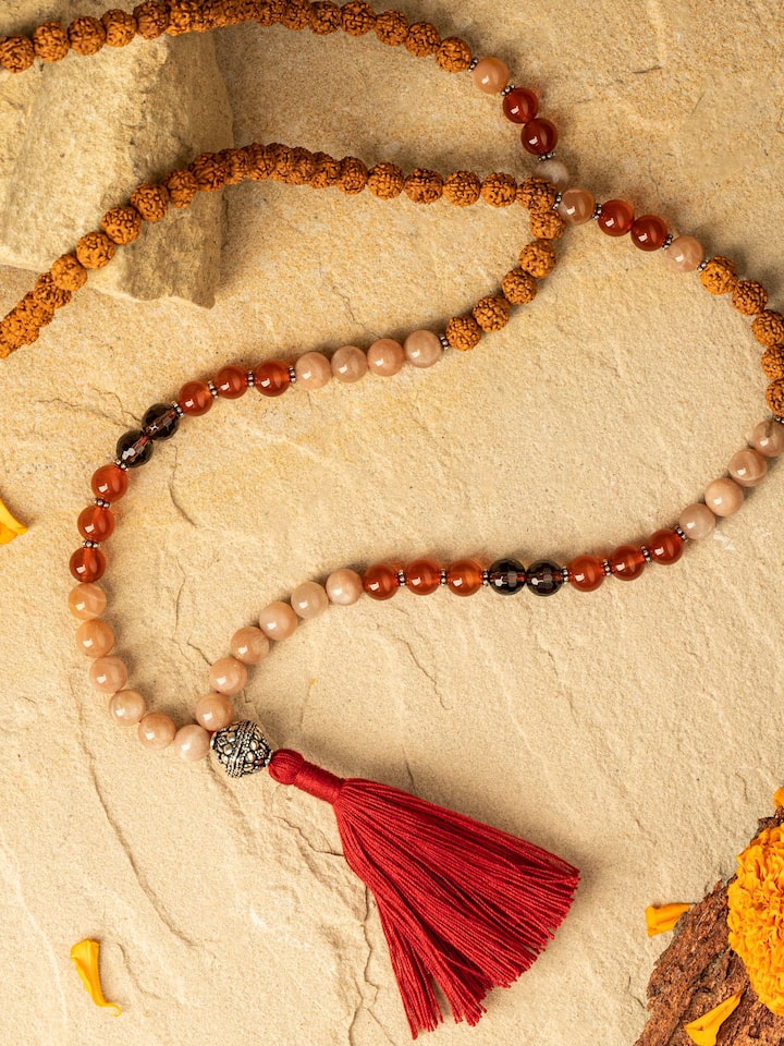 Smoky Quartz, Black Onyx & Peach Moonstone Silver Mala displayed with a natural background to enhance its elegance