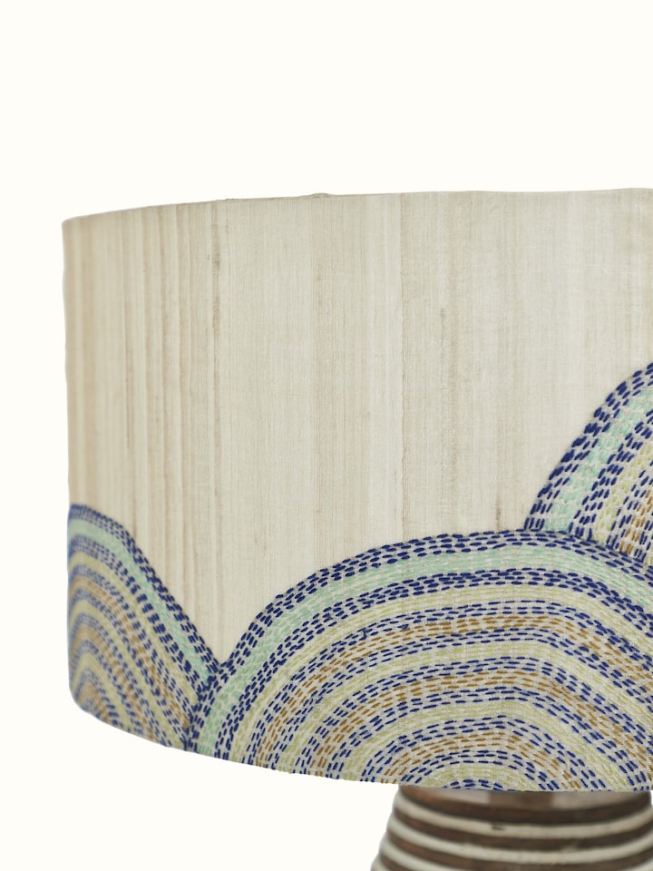 Detailed close-up of Sujani hand-embroidered cotton lampshade in beige color emphasizing the texture