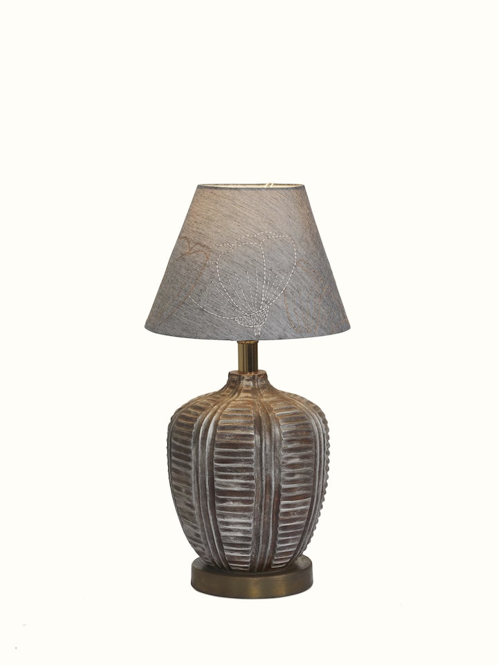 Angled view of Sujani embroidered cotton lampshade in medium grey color displaying its refined embroidery and stylish appearance