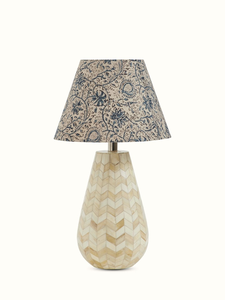 Front view of Sugauli kalamkari block-printed cotton lampshade in blue color displaying its traditional motifs