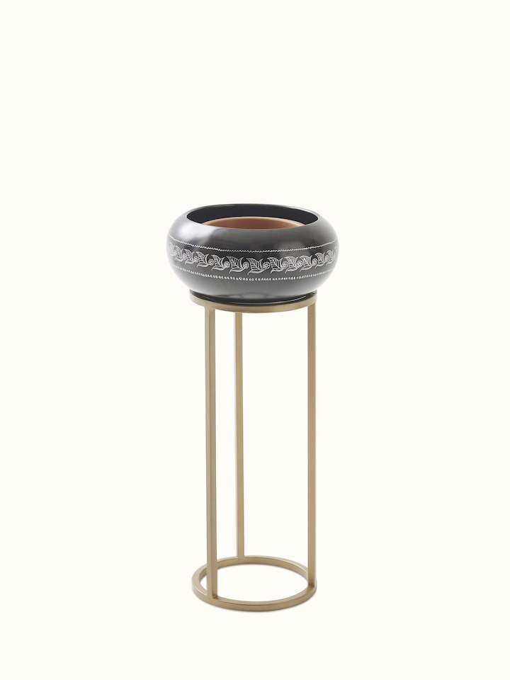 Angled view of Traditional Black Pottery Ceramic Planter highlighting its elegant and classic design.