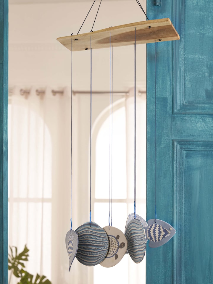 Side view of Resonant Ceramicware Clay Wind Chime showing intricate detailing and finish