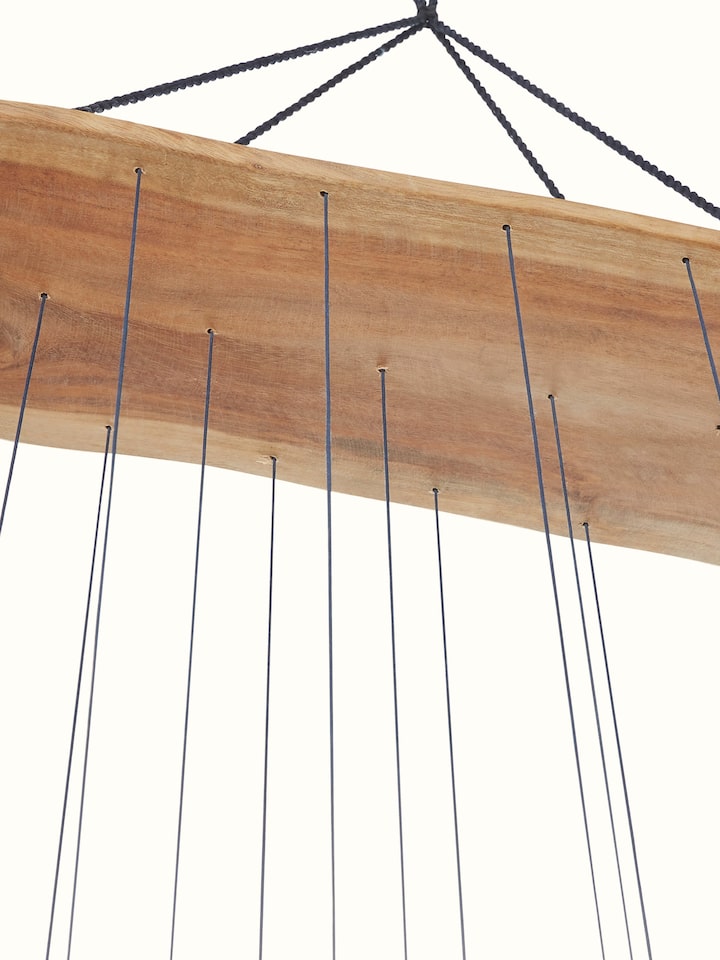 Close-up of ceramicware clay wind chime emphasizing its craftsmanship