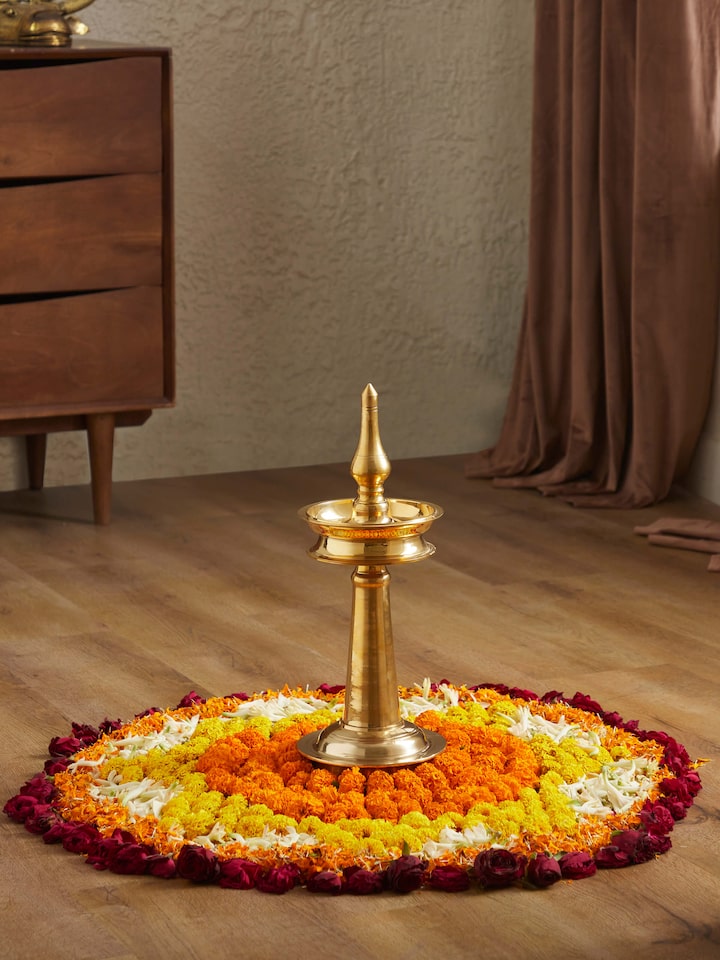 Side view of Polished Brass-Plated Samai Vilakku Stand Diya focusing on the detailing of the stand