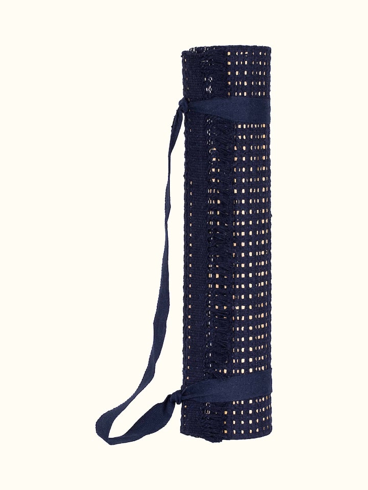 Close-up of Indigo Stripe Natural Grass Cotton Yoga Mat showing its eco-friendly material and vibrant stripes
