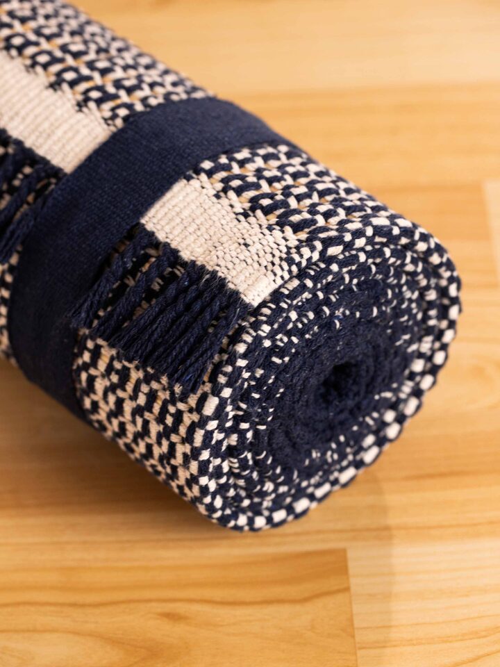 Close-up of Indigo Ombre Natural Grass Cotton Yoga Mat, showcasing its elegant finish and eco-friendly material