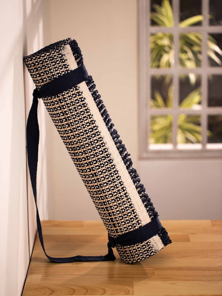 Side view of Indigo Ombre Natural Grass Cotton Yoga Mat highlighting its beautiful ombre design and texture