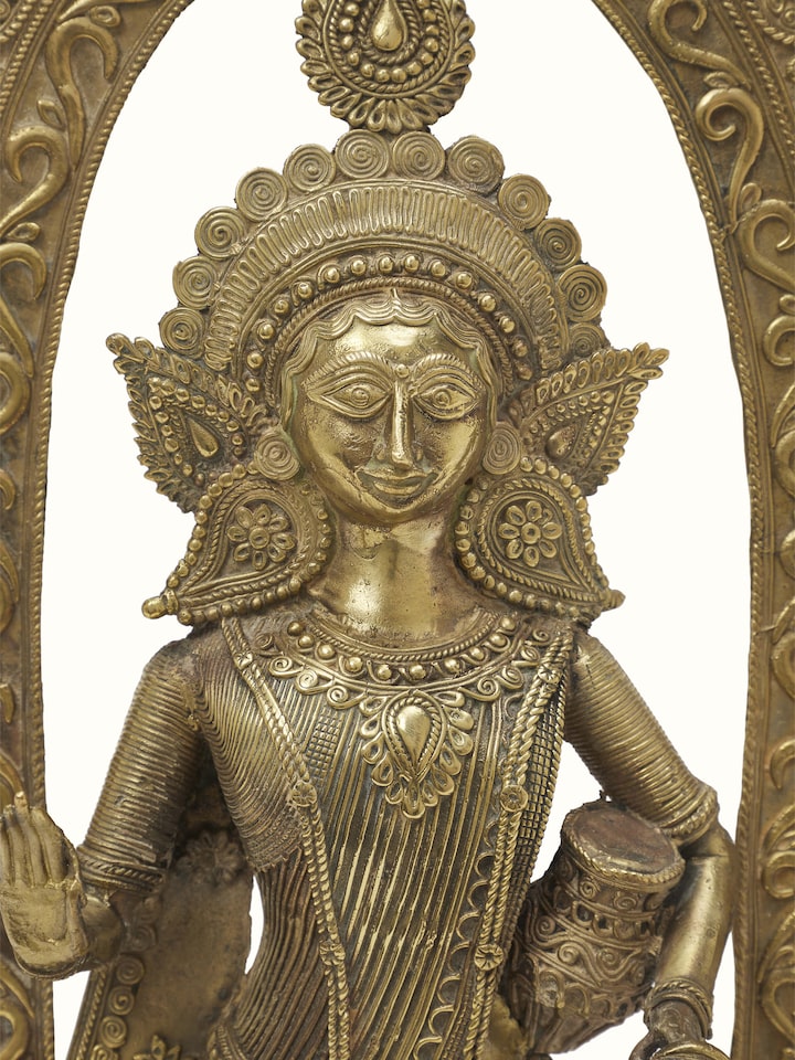Artistic view of Vasudha dhokra brass Lakshmi idol, highlighting the overall craftsmanship.