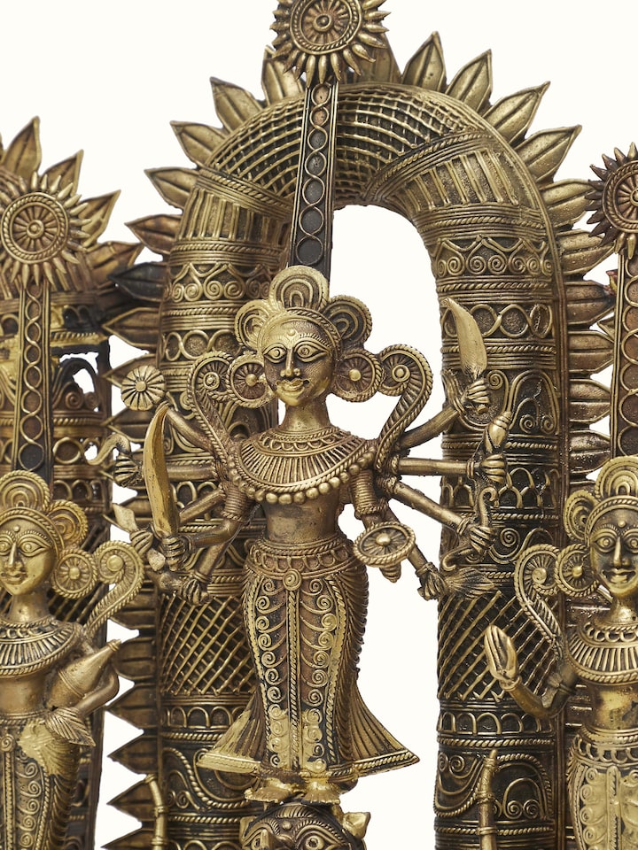 Detailed view of Pristine dhokra brass goddess idol emphasizing fine artistry and delicate features
