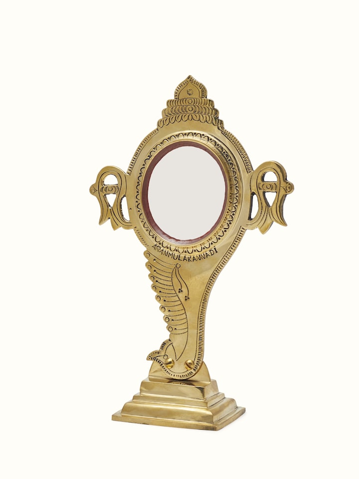 Close-up view of Natural Aranmula Kannadi Brass Mirror highlighting the handcrafted detailing and finish