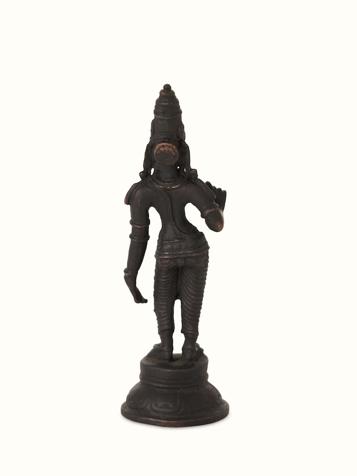 Bronze casting of Goddess Parvathi idol with detailed close-up of the craftsmanship.