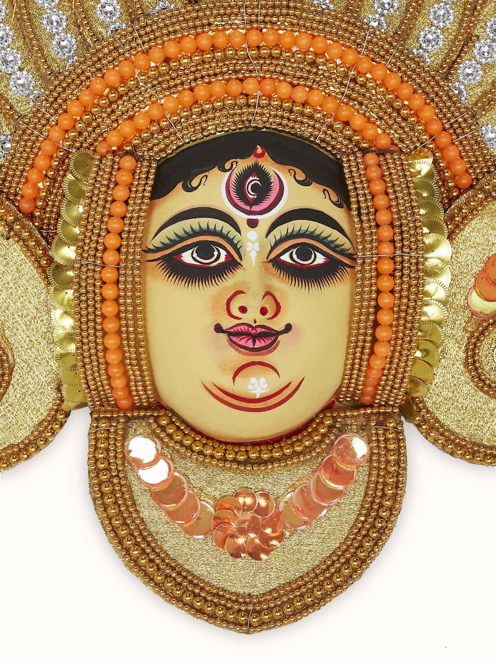 Detailed angle of Chhau Devi wall mask, highlighting the craftsmanship and colors.