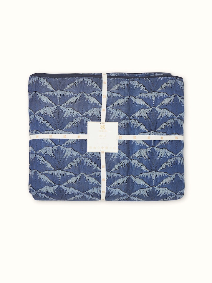 Close-up view of the Sanganeri block print details on the Parvat quilt