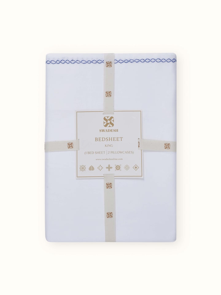 Parvat blue stripe cotton hand-embroidered king bedsheet set showing the texture and design