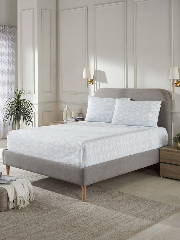 Close-up view of Parvat blue textured cotton Sanganeri block printed queen bedsheet set highlighting the intricate block print