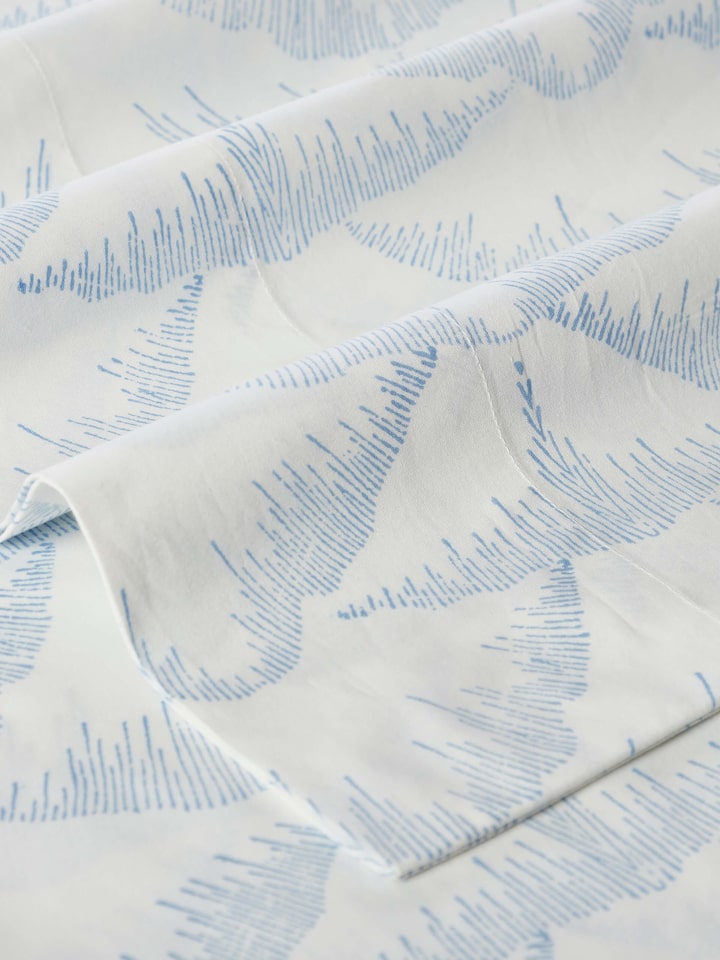 Detailed view of Parvat blue textured cotton Sanganeri block printed queen bedsheet set showcasing the design and print quality
