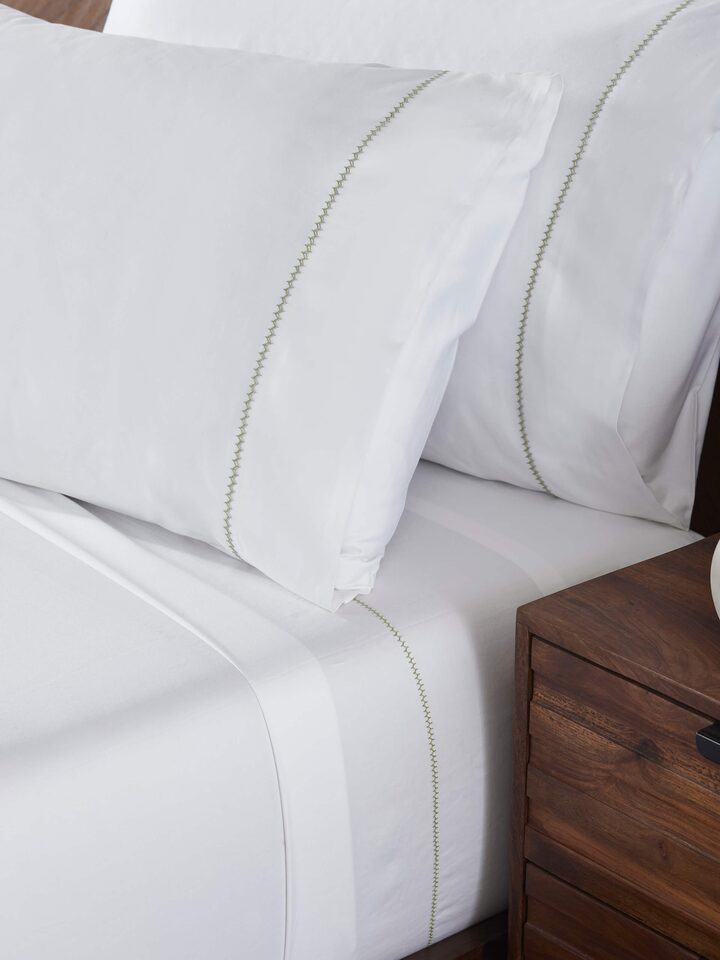 Parvat beige stripe cotton hand embroidered bedsheet king set spread out to show the full design, including the beige stripes and embroidery.