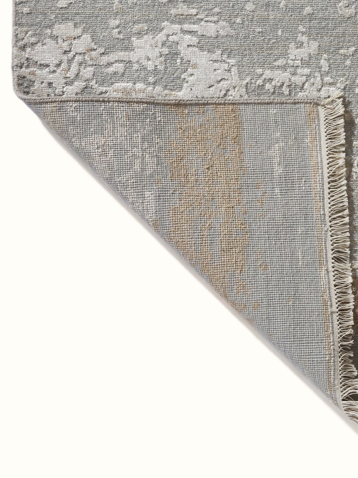 Back view of abstract grey taupe Agra rug showing fine hand-knotting technique