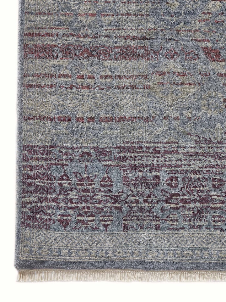 Close-up of the intricate knotted texture and worn-in vintage finish.