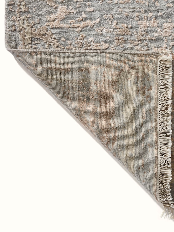 Back view of Abstract modern grey blush wool & viscose hand-knotted carpet revealing texture and finish