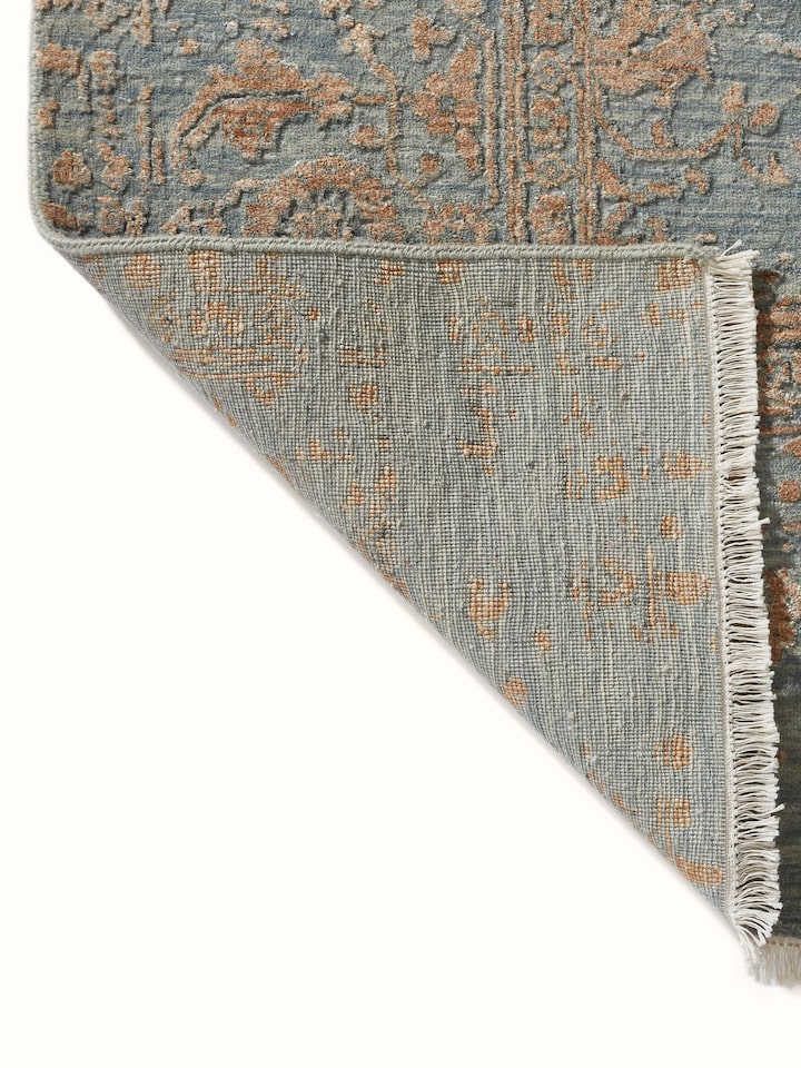 Back view of Distressed Transitional Grey Copper Agra Wool & Viscose Hand-knotted Carpet showing the reverse weave