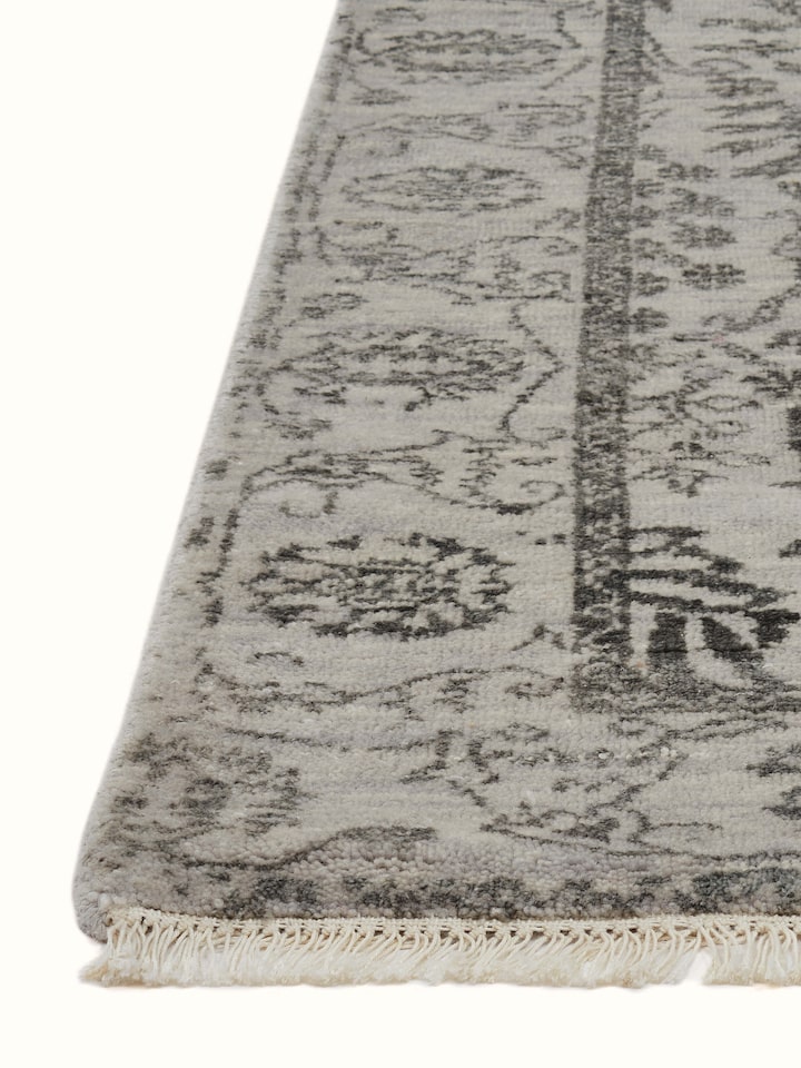 Detailed view of distressed transitional grey charcoal Agra wool & viscose hand-knotted runner.