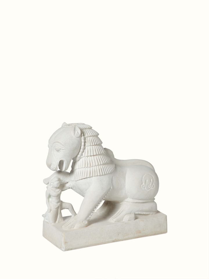Side view of Shourya Carved Stone Shardul Large Sculpture, showcasing the intricate stone carving and detail