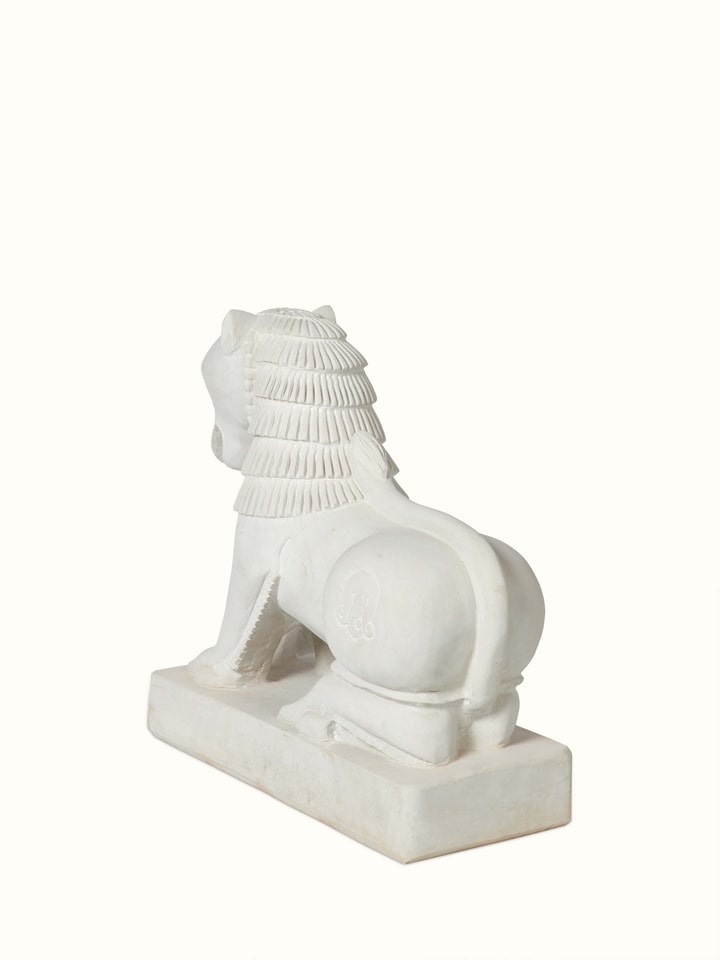 Artistic view of Shourya Carved Stone Shardul Large Sculpture, showing the sculpture from a unique angle