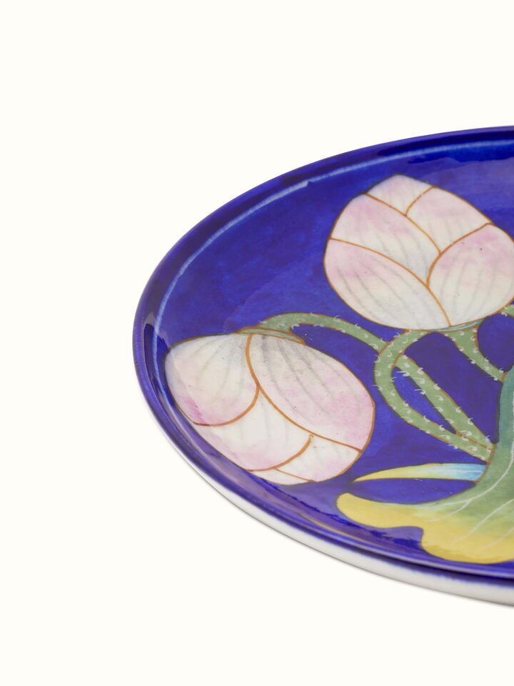 Back view of Blue Pottery Lotus with Leaf Display Plate by Swadesh showcasing the smooth pottery surface and delicate craftsmanship.