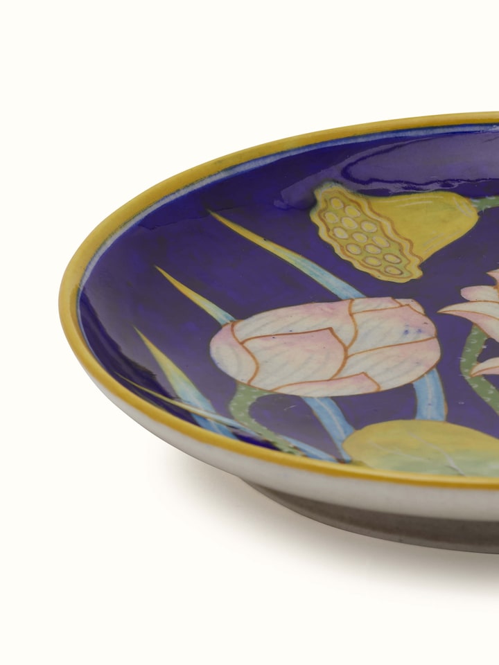 Close-up of Blue Pottery flower with leaf display plate focusing on the beautiful blue glaze and intricate patterns