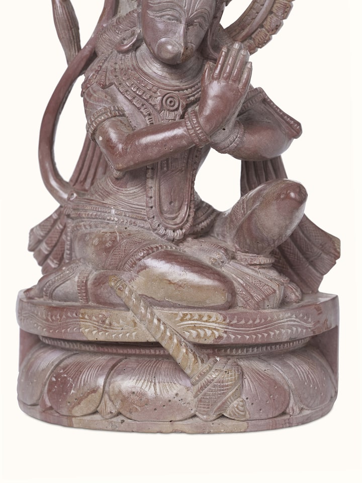 Detailed view of Carved Stone Hanuman Idol, focusing on the craftsmanship and fine details