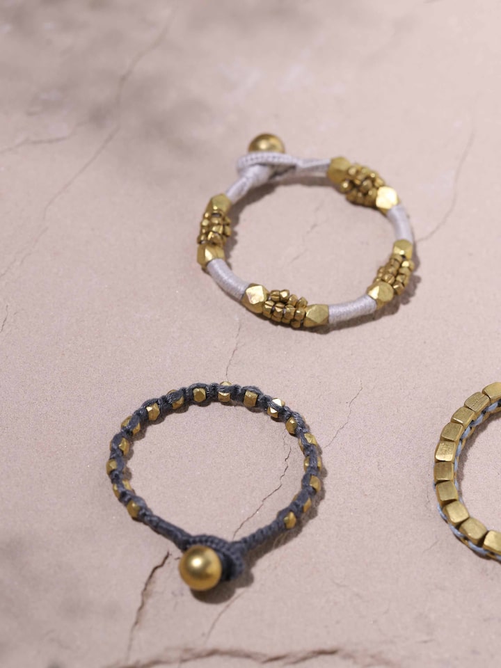 Side profile of Silver Smithing drop earrings showing detailed silverwork.