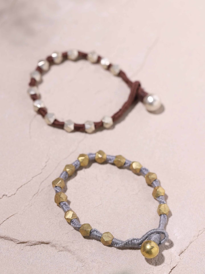 Back view of Dhokra Bracelet Set showing the secure clasps and overall design.
