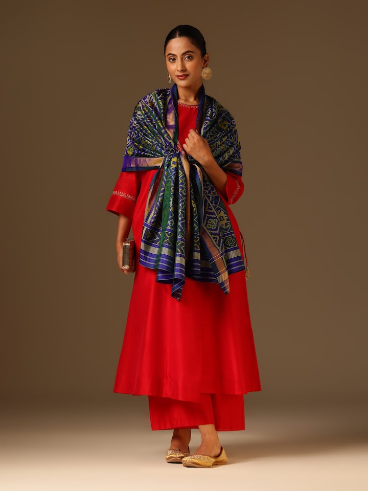 Lifestyle view of Blue Silk Ikat Dupatta draped elegantly showing flowing silk texture and ikat design.