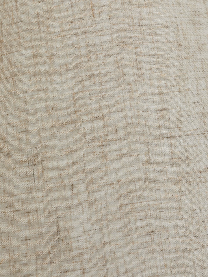 Detailed view of Studio pottery & cotton table lamp in grey color emphasizing the texture and shade design.