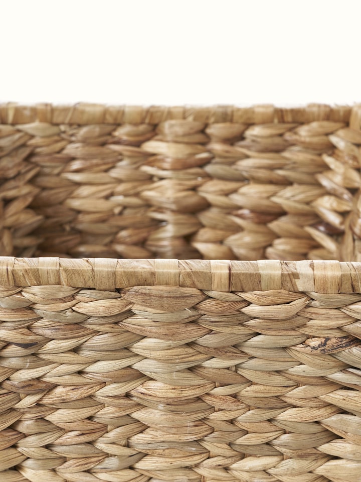 Side view of natural water hyacinth fibre storage organiser, showing its practical design and sturdy build.
