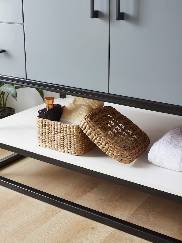 Side view of natural water hyacinth fibre storage basket, showcasing the craftsmanship.
