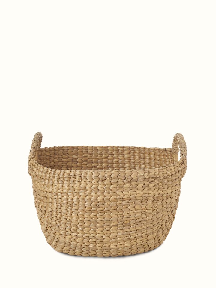 Front view of Matte natural water hyacinth fibre storage organiser highlighting its natural texture and organizational design.