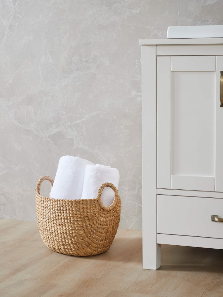 Side view of Matte natural water hyacinth fibre storage organiser showcasing its sleek profile and material quality.