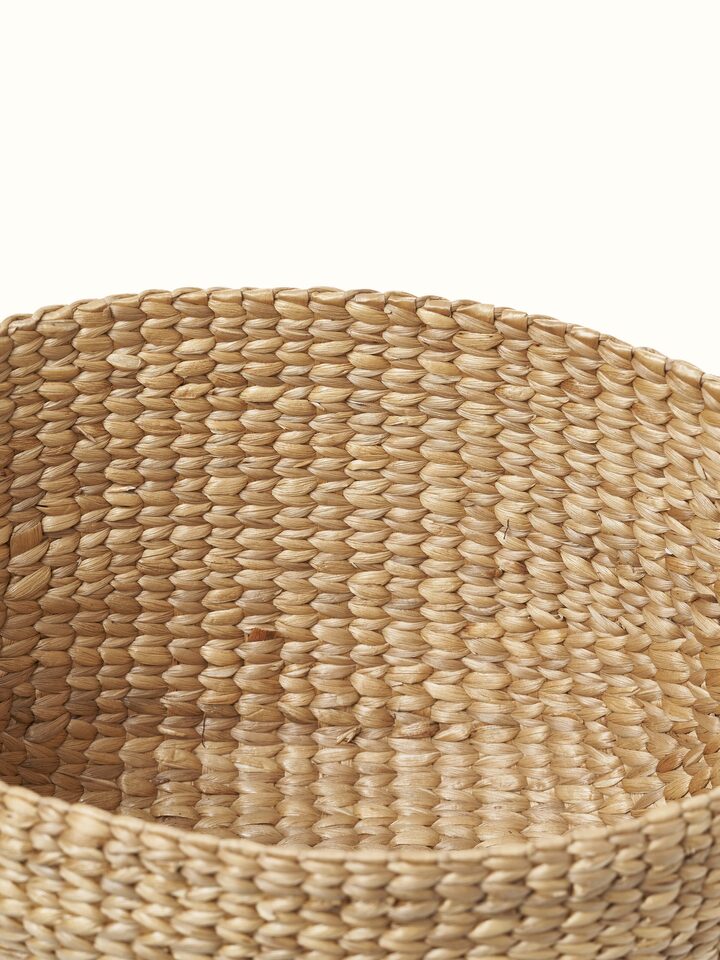 Close-up view of Matte natural water hyacinth fibre storage organiser focusing on the texture and craftsmanship of the material.