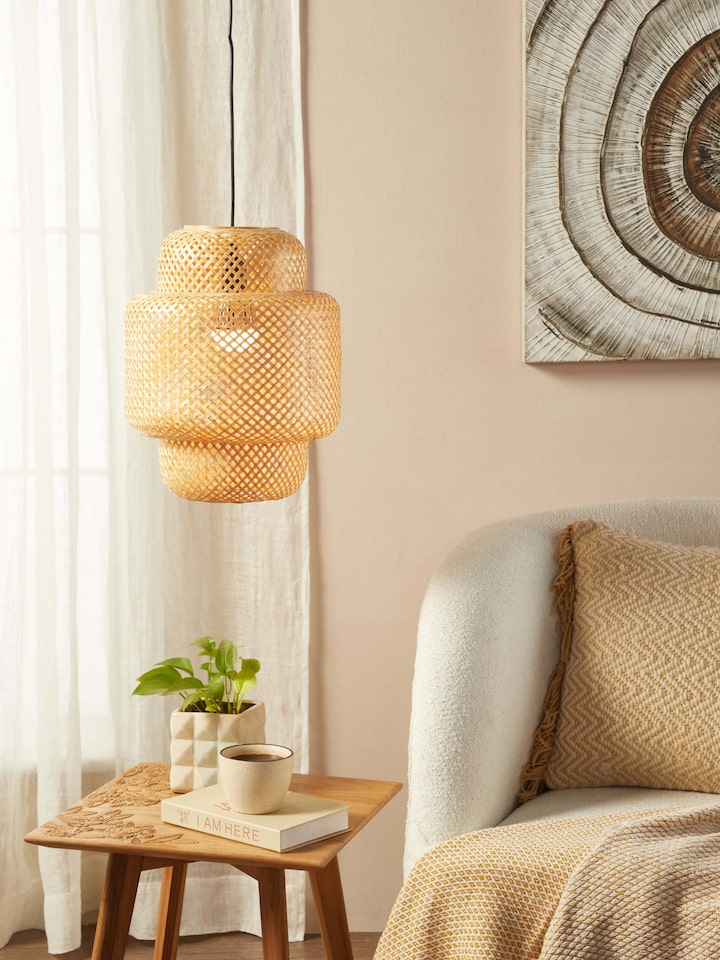 Side view of Bamboo LED pendant light medium highlighting the sleek bamboo structure and modern LED features.