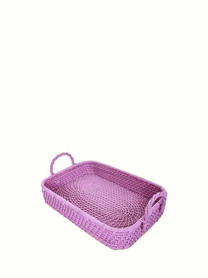 Detailed view of cane storage organiser in pink color, emphasizing the quality of the cane work and the elegant pink hue