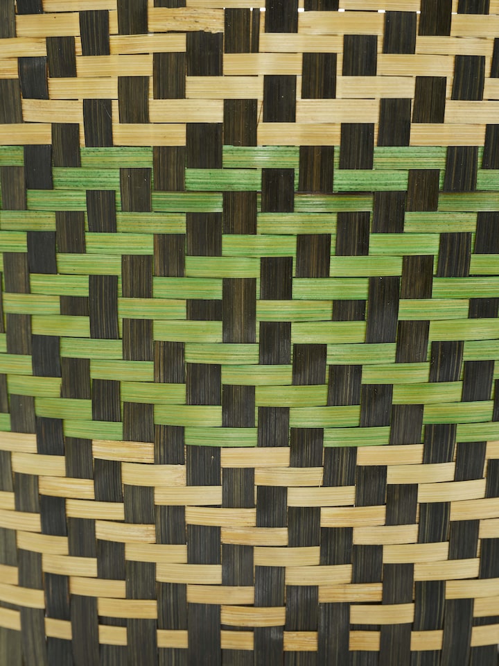 Close-up of Bamboo Waste Bin in green color, focusing on the bamboo weave and eco-friendly material