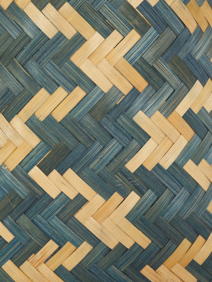 Detailed view of Bamboo Waste Bin in blue color, focusing on the texture and finishing of the bamboo