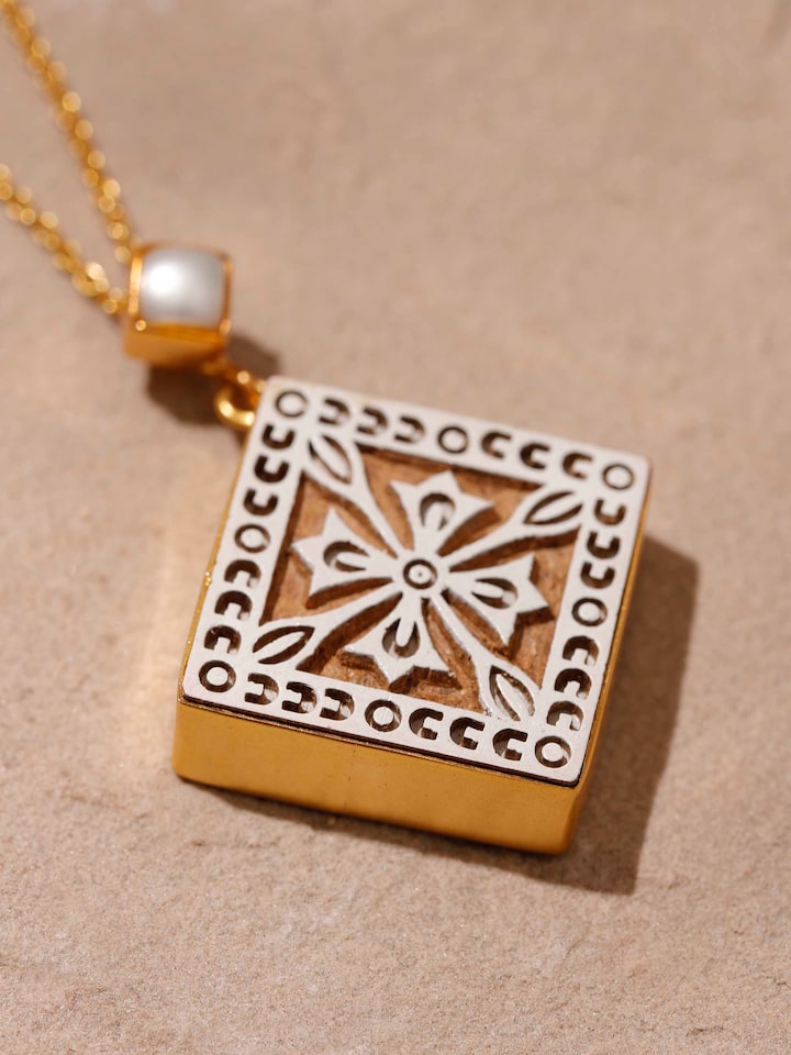 Detailed view of Teakwood Pendant & Chain highlighting the pendant’s craftsmanship and chain detail