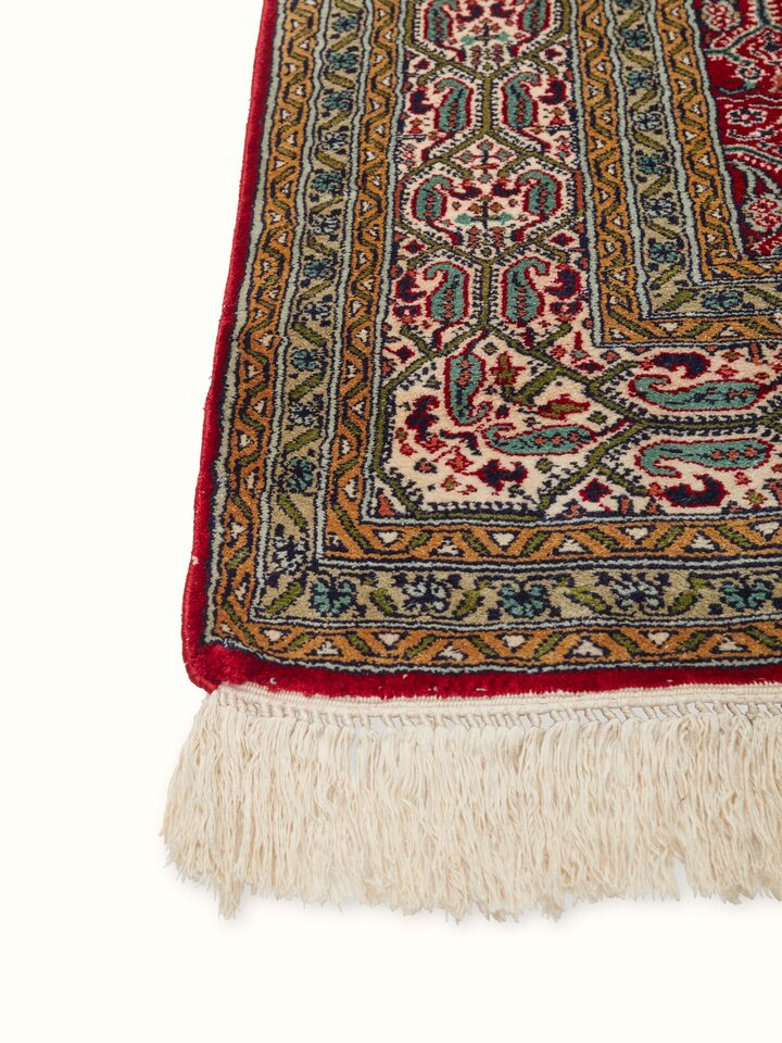 Front view of Traditional Persian Red Senna Kashmir Silk Hand-Knotted Carpet showcasing the full design and vibrant red hue.