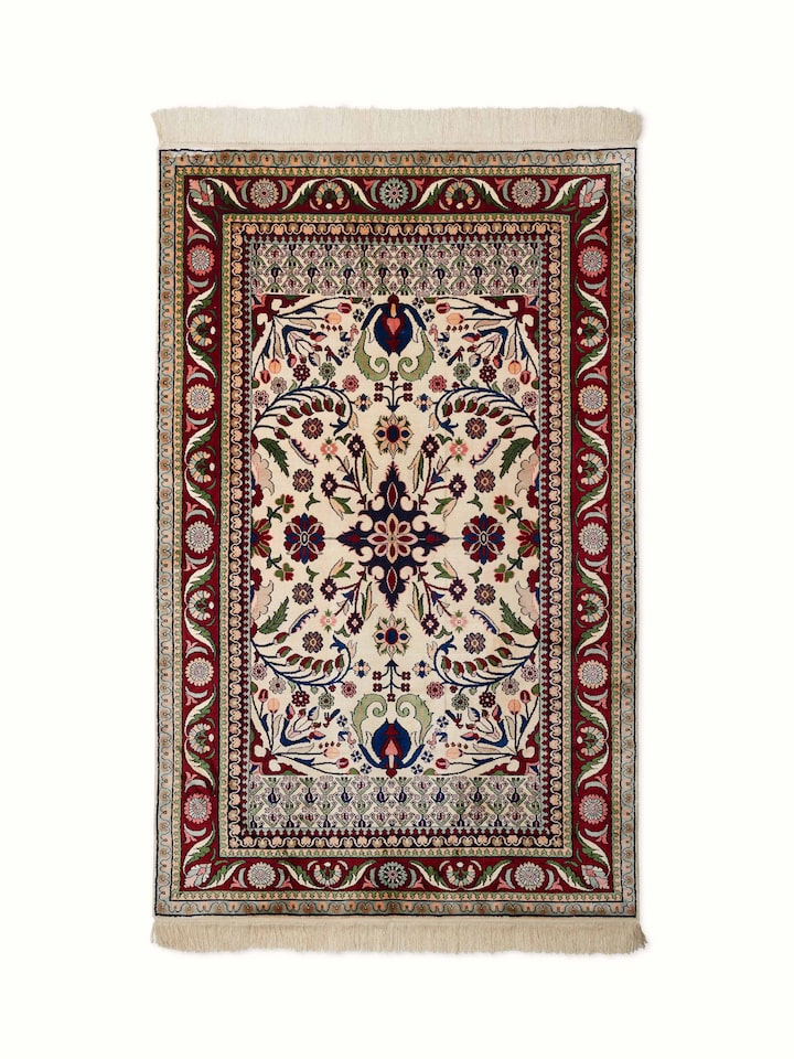 Front view of Traditional Persian Isfahan Kashmir silk hand-knotted carpet showcasing intricate floral motifs