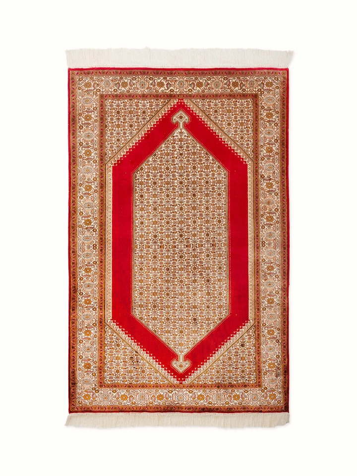 Full view of Traditional Persian Red Senneh Kashmir Silk Hand-Knotted Carpet showing the rich red color and intricate design.