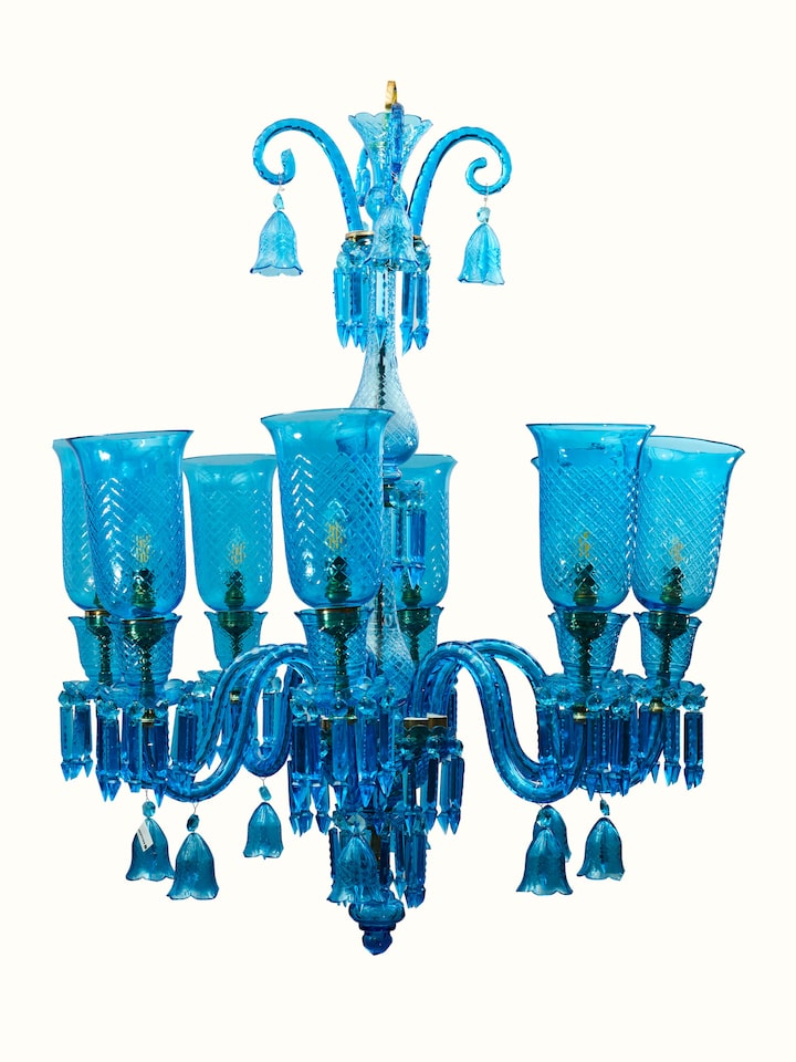 Side view of Blue Glass Chandelier showcasing its hanging style and elegant glasswork.