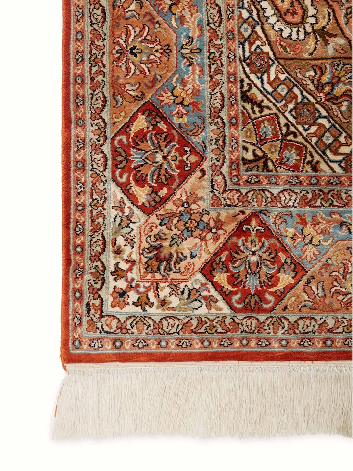 Detailed view of Traditional Persian rust khatamband Kashmir silk hand-knotted carpet showcasing its complex design